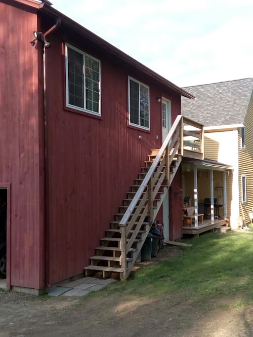 Private entrance to apartment on back side of garage.