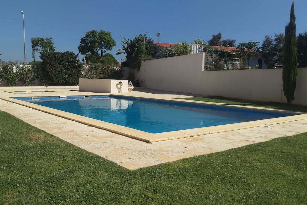 2 Pools- one for kids and another for adults with a garden