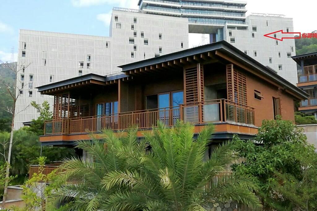 你将入住此栋公寓(带白色幕墙)