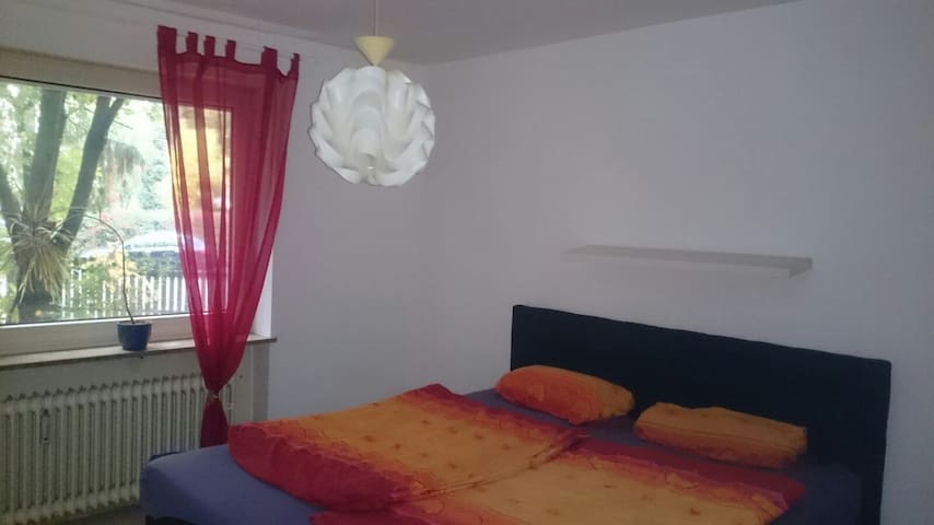 18qm bedroom, big bed, desk and chair.