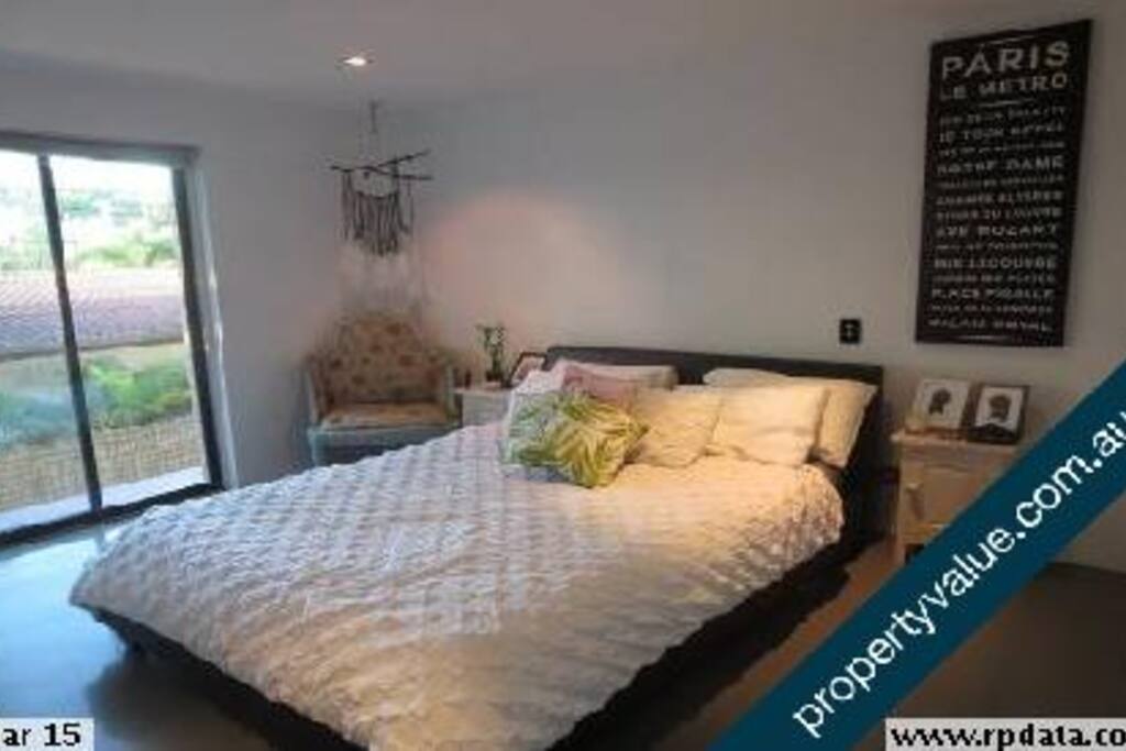 Main Bedroom with access to the Balcony