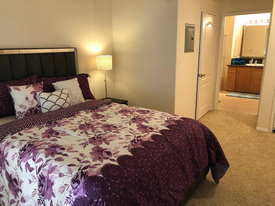 Queen bed in bedroom