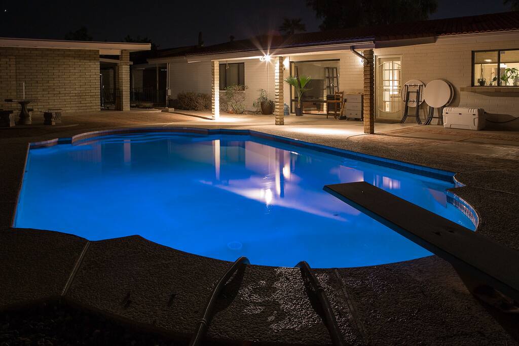 Pool area back yard. guet house on left main house above, right
