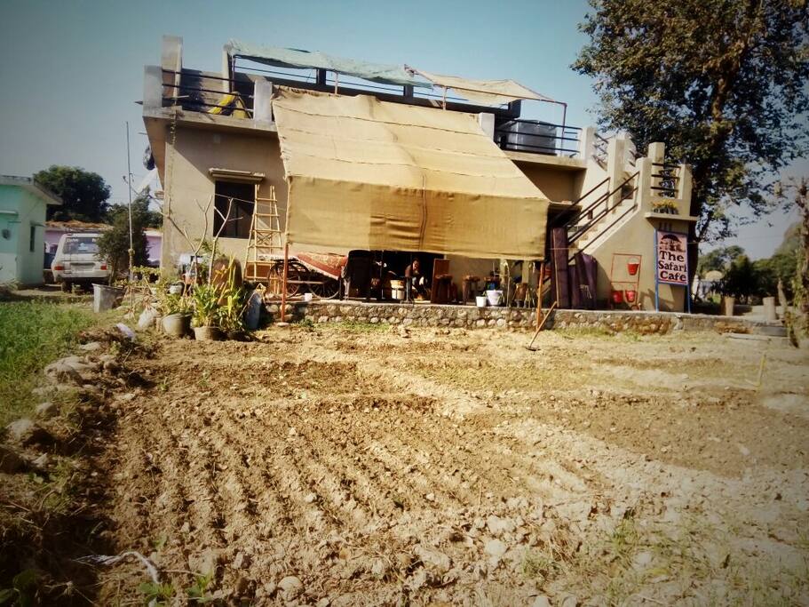 The front of the house at the beginning of the year before planting of wheat.