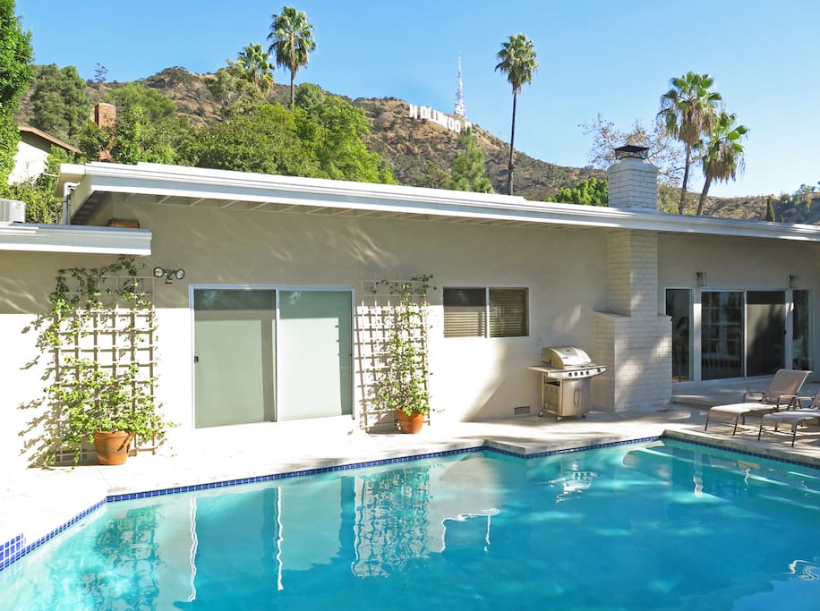 Solar-heated pool/spa overlooking the iconic Hollywood Sign.