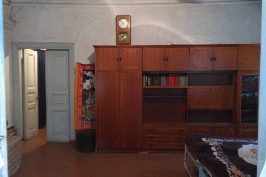 second bedroom with 3 beds and one sofa