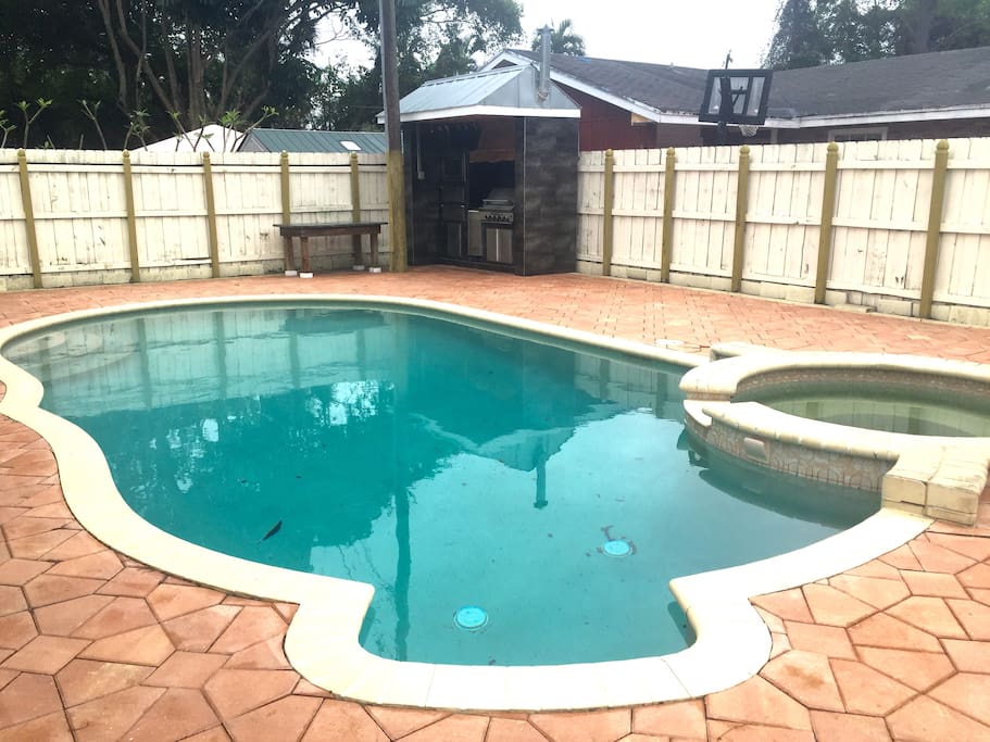 Pool with gazebo, large outdoor couch. Pool is unheated which is very refreshing on a hot Florida afternoon.