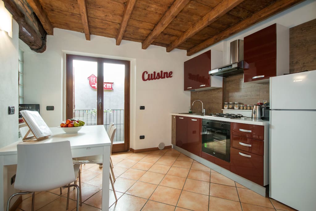 pic by Airbnb - kitchen and dining room (and small balcony)