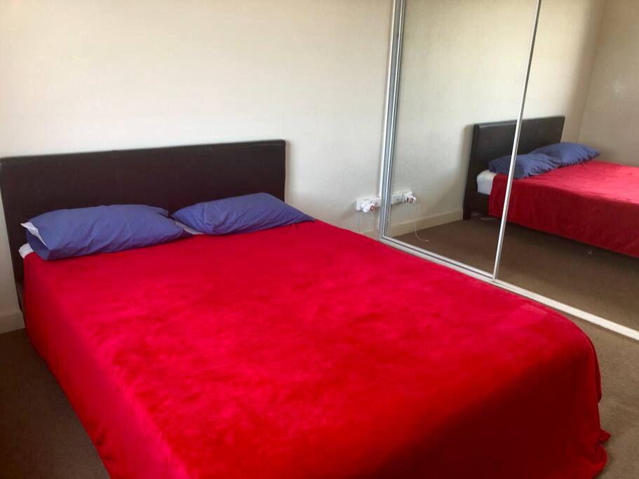 Queensize bed in a private room