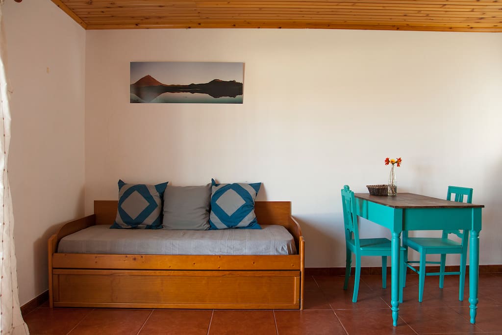 Living area ("sofa" with one single bed) / Dining area