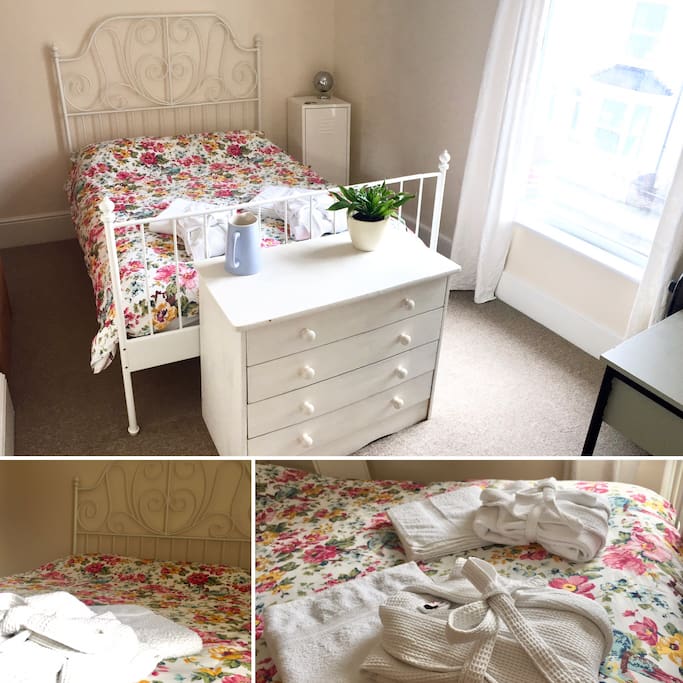 Comfortable double bed with new mattress and cotton sheets.