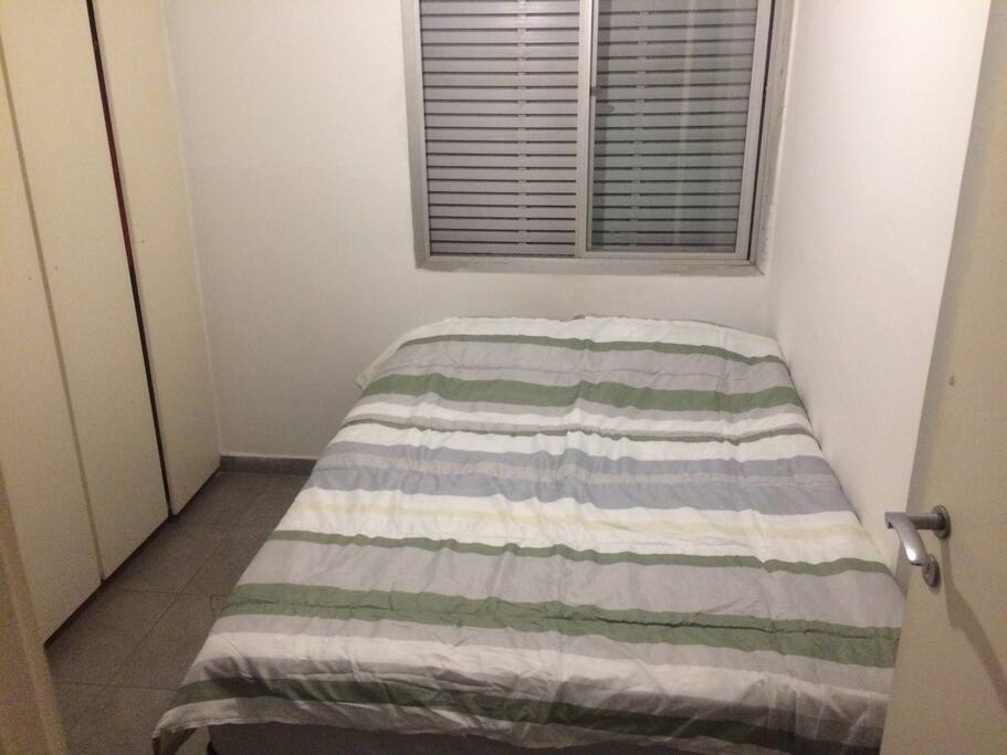 Master bath, double bed, wardrobe and 42" TV