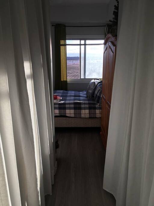 Walk through to the bedroom from the washroom