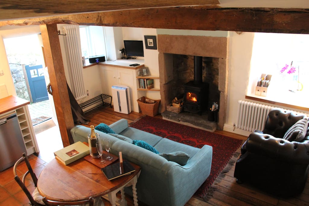 living room with log burning stove - when extended table can seat dining for 4