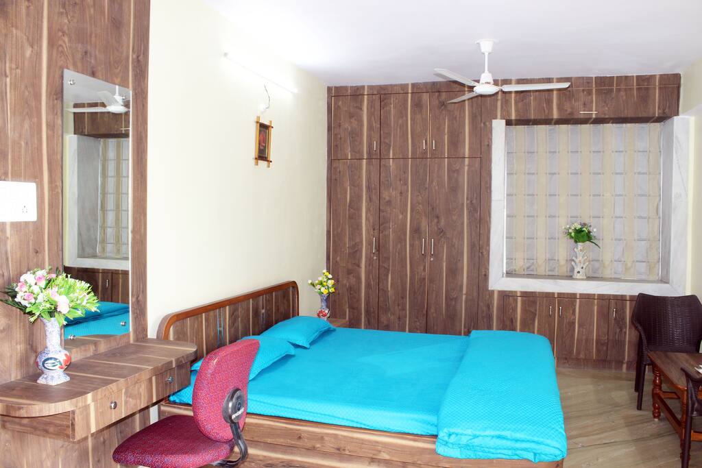 AC Room with Att Washroom, King Size Bed with Mattress Protector, Bedsheet, Pillows and Comforter alongwith Wardrobes, Dressing cum Study Table, Chairs, Centre and Side Table.