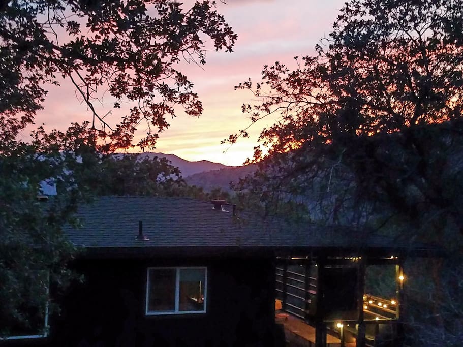 See beautiful Sunsets every night, from this over 1,800 Sq ft. home, that has a large deck, and over an acre of land to explore.