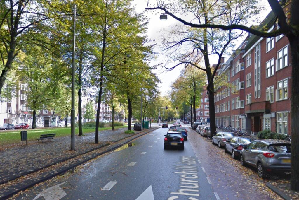The street in front ot the apartment (enough parking space + public transport in front of the apartment)