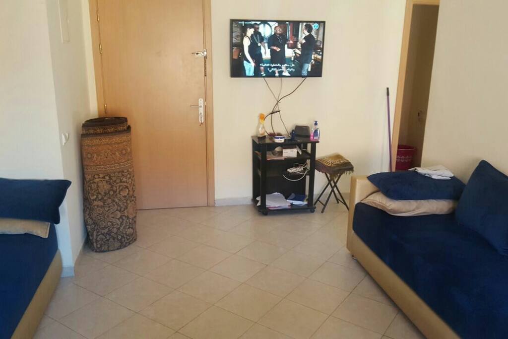 living room "Tv ,Sofas,table.."