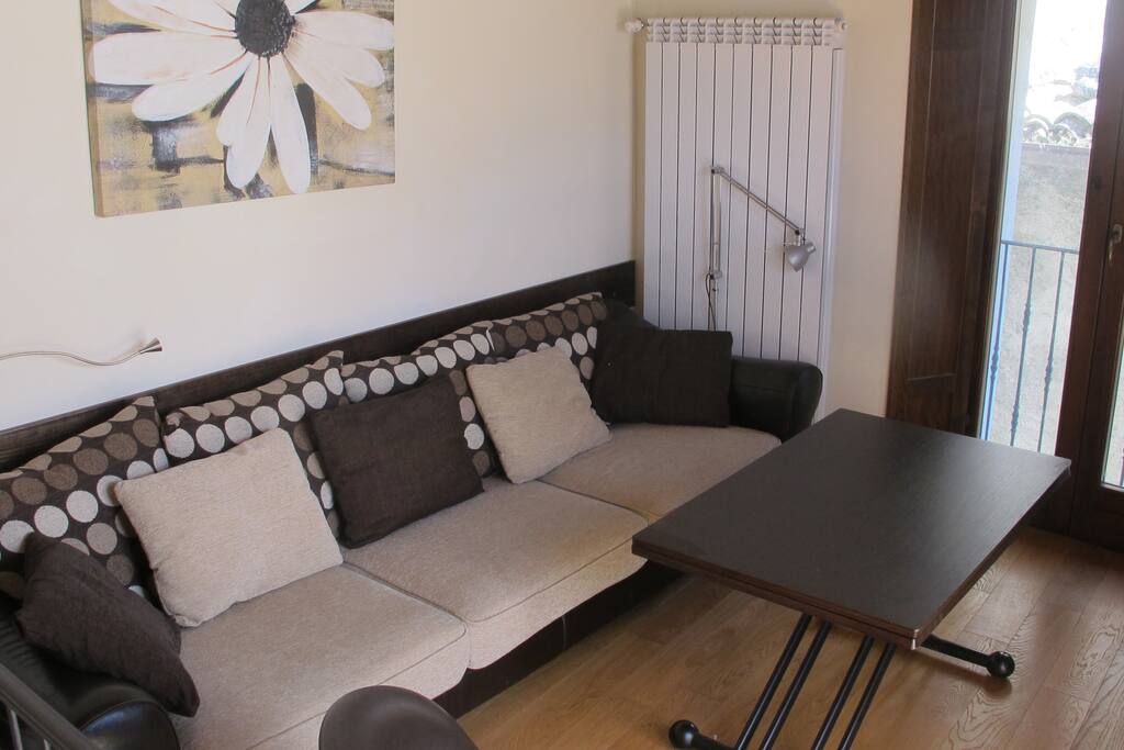 Living room which opens onto roof terrace