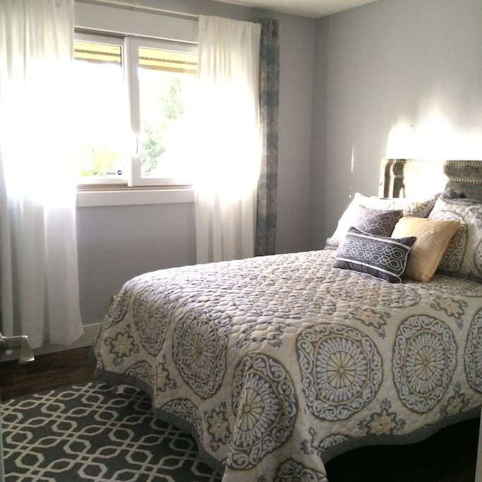 One full size bed in grey/yellow/white