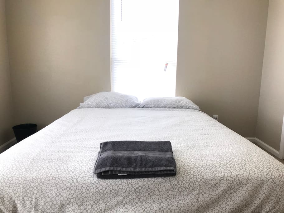 Queen Mattress in a spacious room