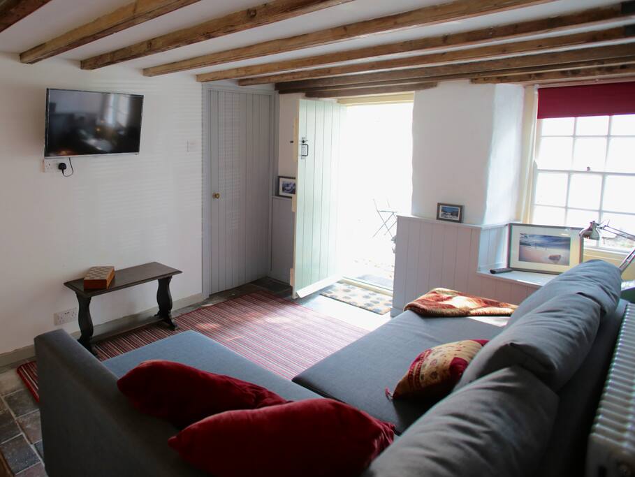 Living room with access to courtyard
