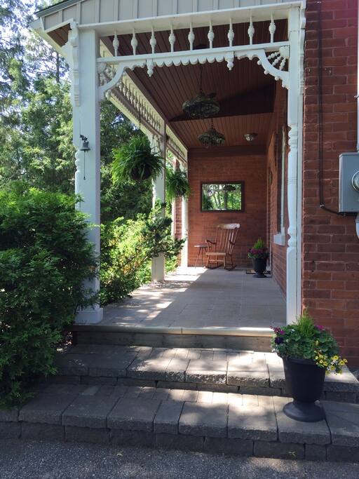 Front porch with sitting area and Tiffany lamps