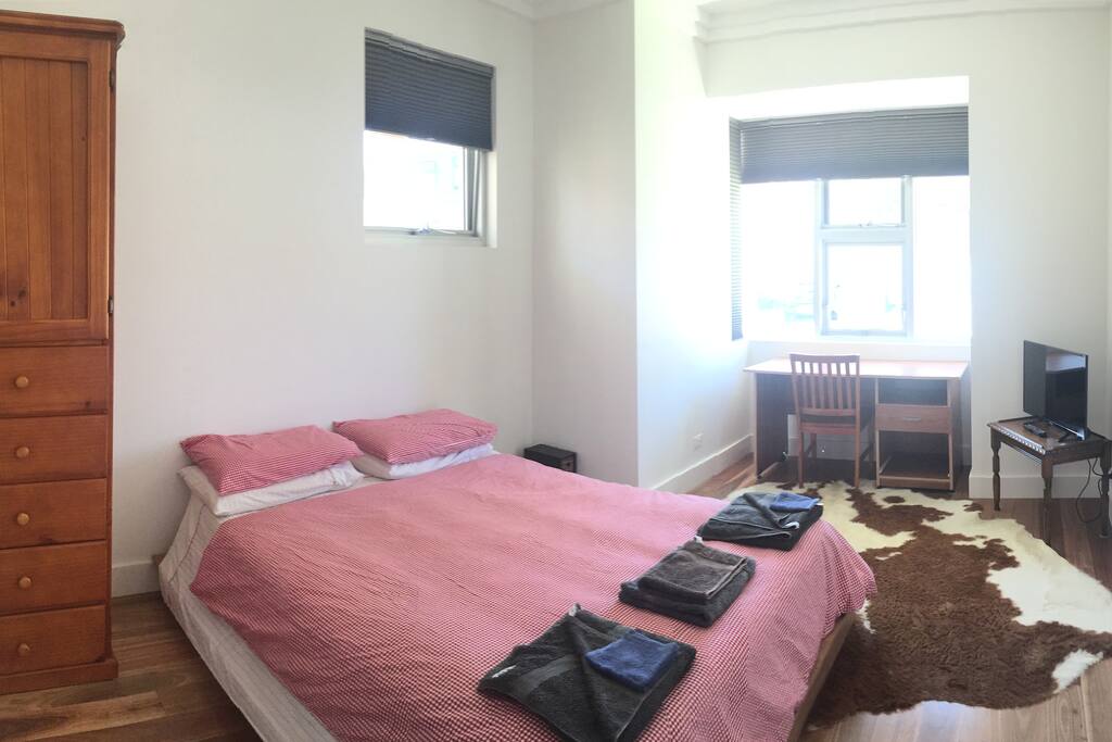 This bedroom has enough space for a young child to stay as well.