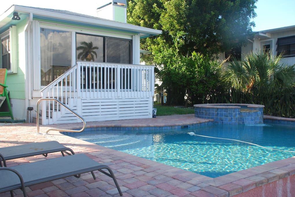 Pool and hot tub. Sliding glass doors off back .