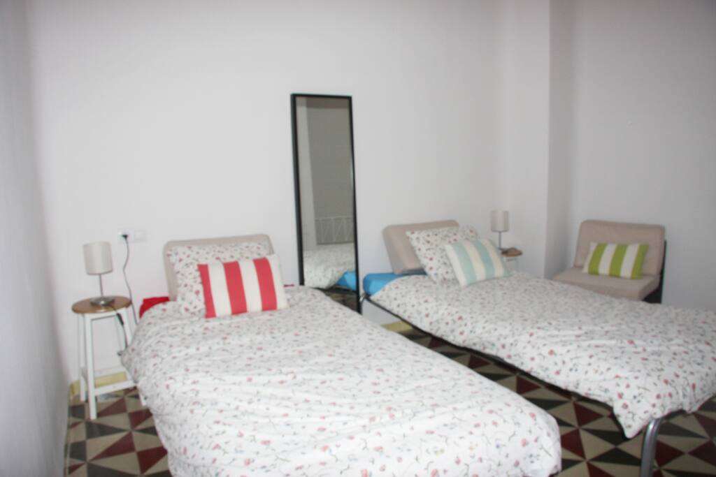 Dormitorio con dos o tres camas, según necesidad ,en la planta alta .