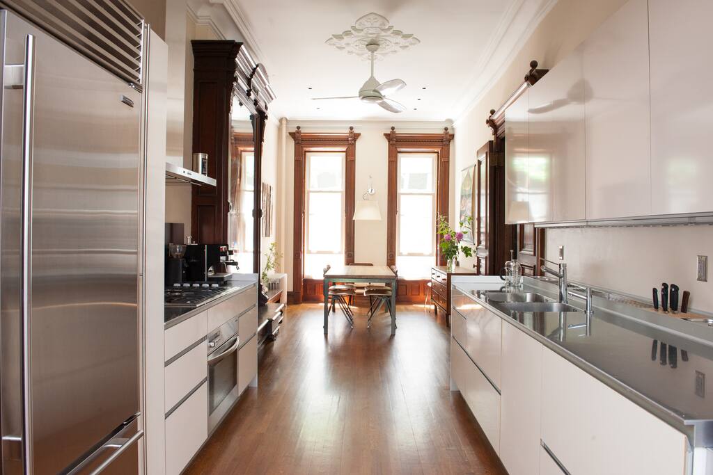 Modern chef's kitchen and dining room