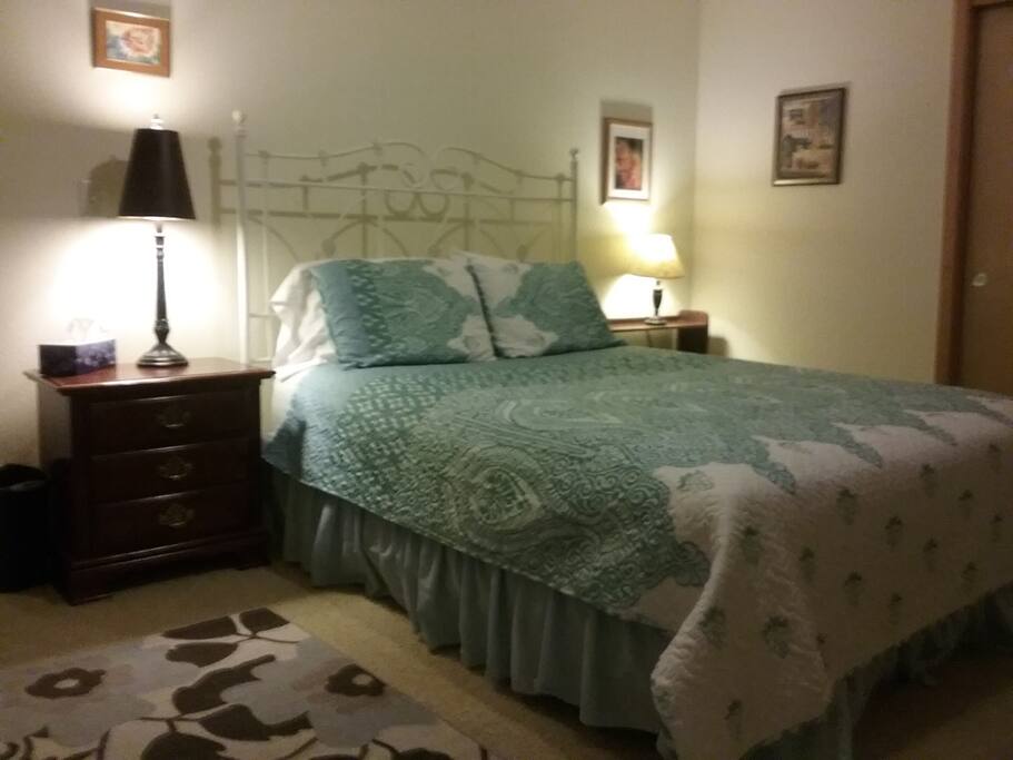 Vintage headboard in spacious bedroom