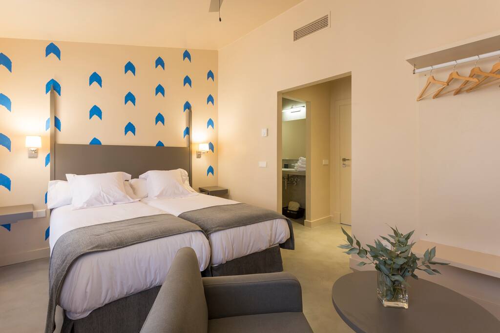 Double bedroom with twin beds and ensuite bathroom.