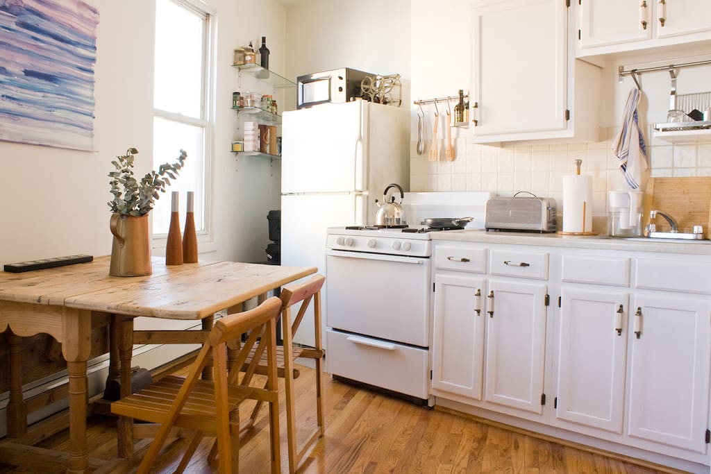 The dining table can be expanded to seat more guests as you share a meal.