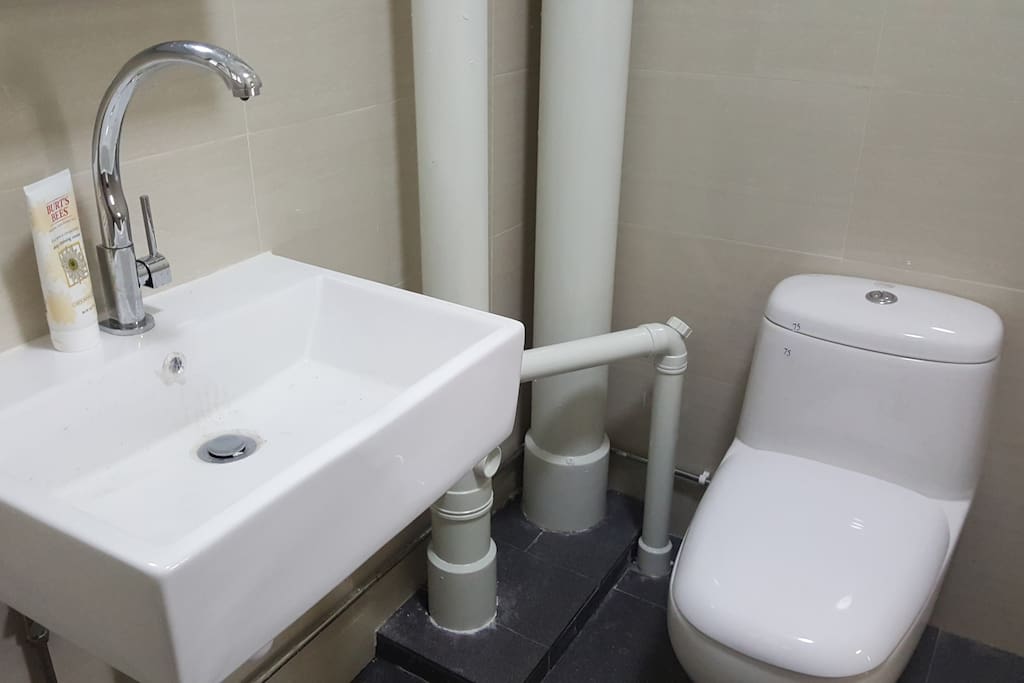 Renovated attached bathroom clean, simple and modern