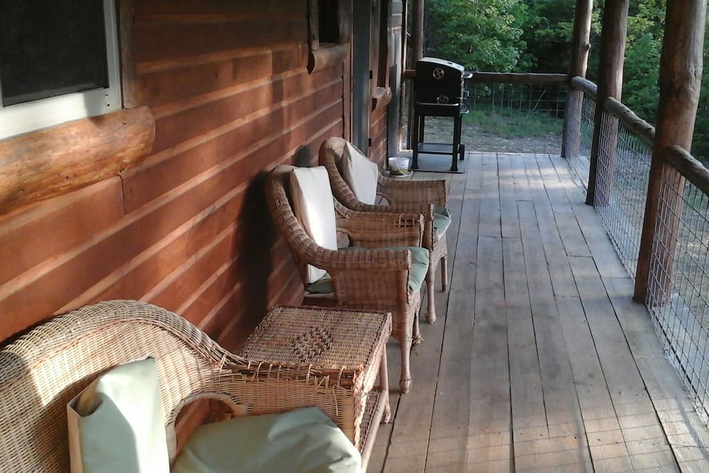 furnished covered porch with charcoal grill