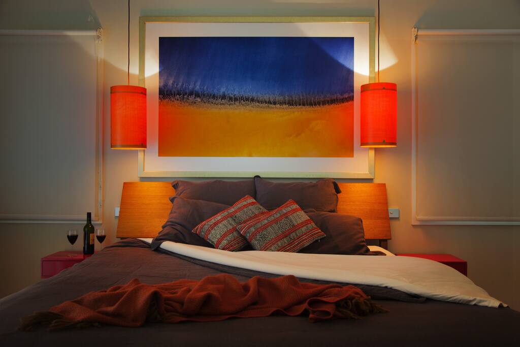 King bed with original artwork