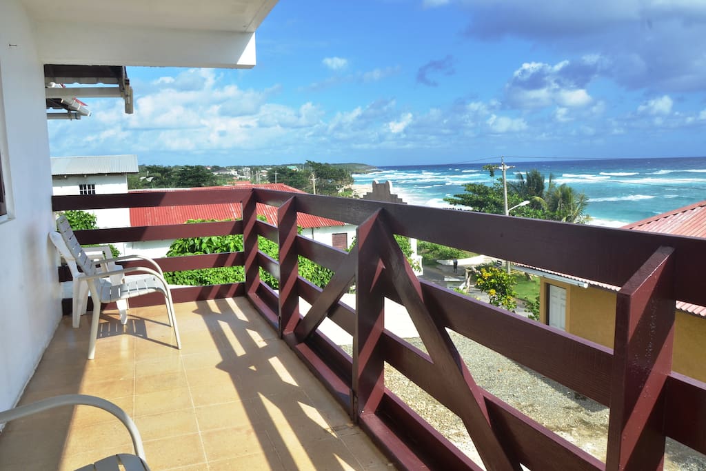 Balcony overlooking Long Bay beach