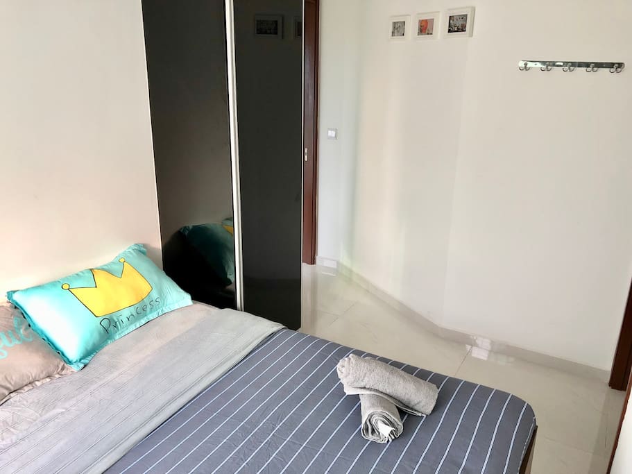 Bedroom with wardrobe and hangers 卧室内置衣柜