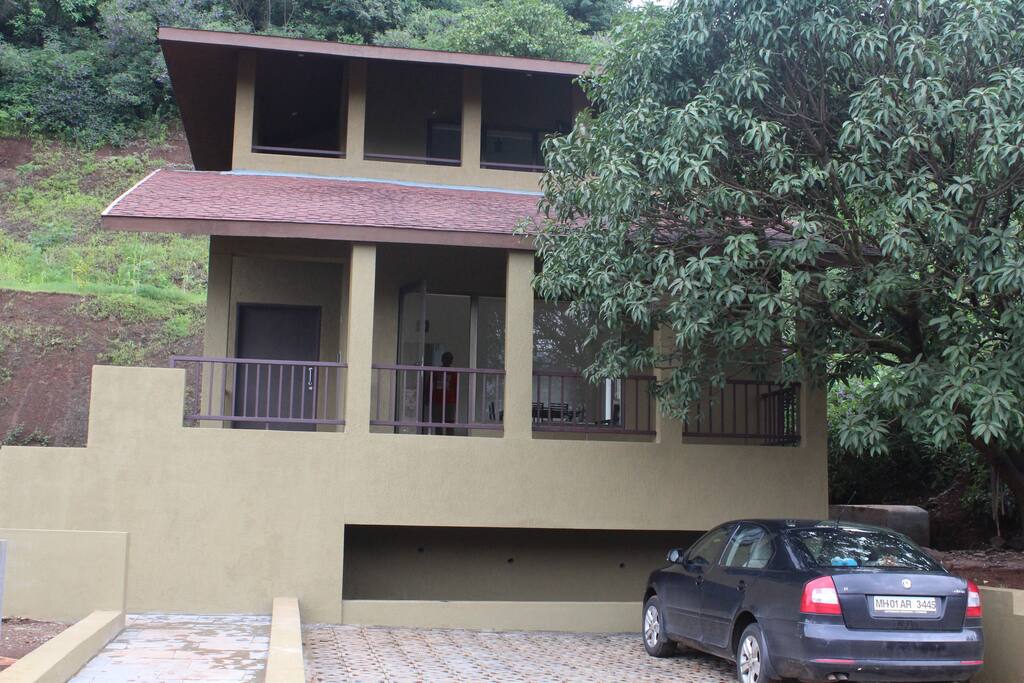Front View of the Spanish style hill view bungalow