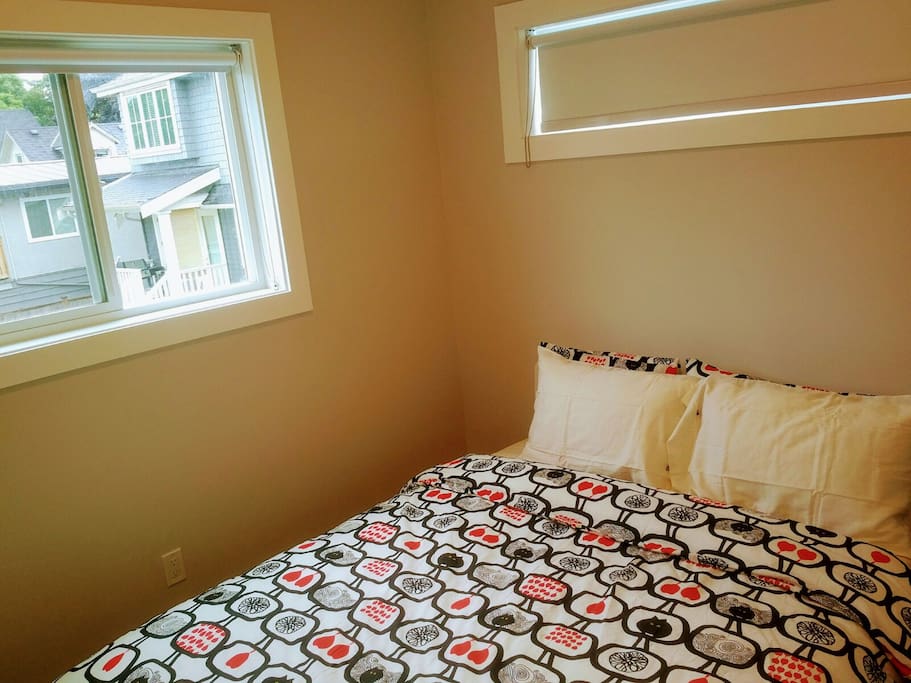 2nd bedroom located at 2nd floor with queen bed.