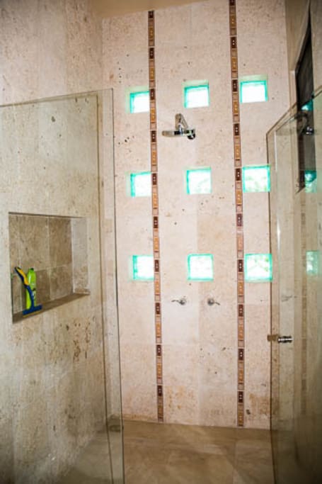 Hot, large, powereful shower with incredible design.