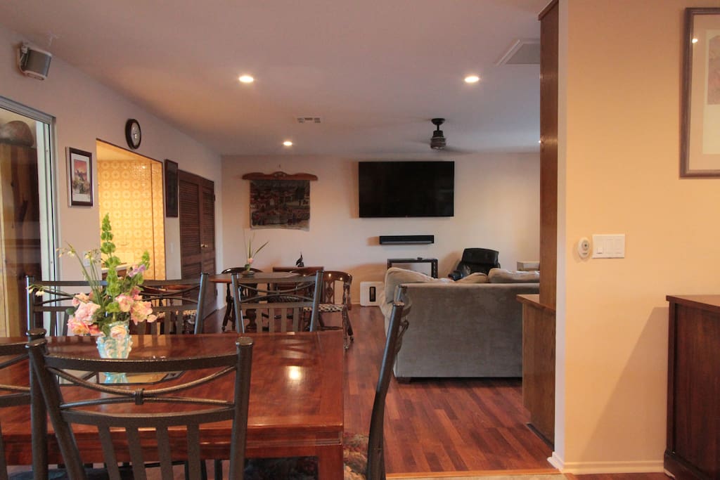 Family room has 70" new ultra 4k TV with surround sound. The wet bar is lit up