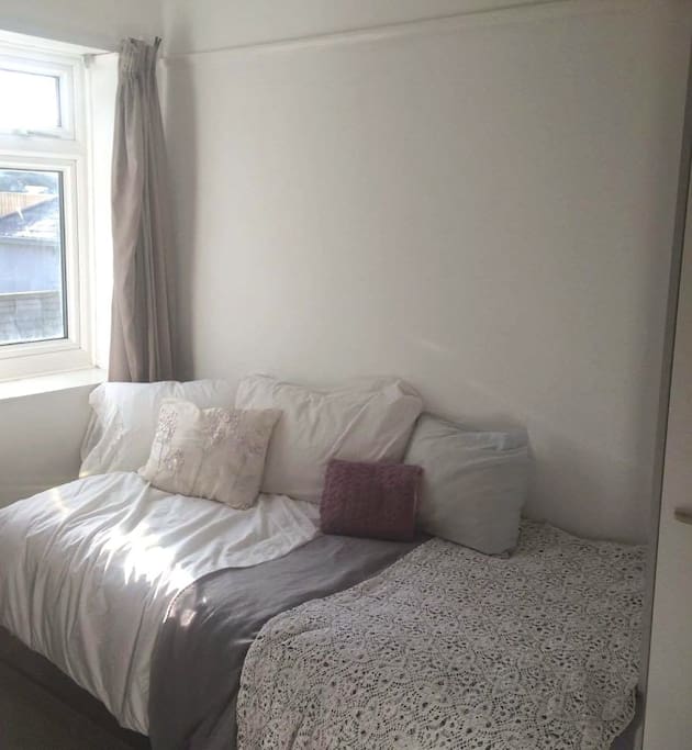 The bed - a basket is provided to pop in unwanted pillows if you prefer just 1 !