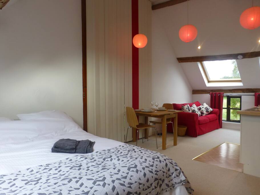 King bed, seating, table and sofa