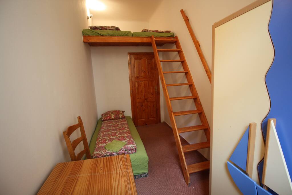 YOUR BEDROOM A arranged for 3 persons, writing desk , wardrobe
