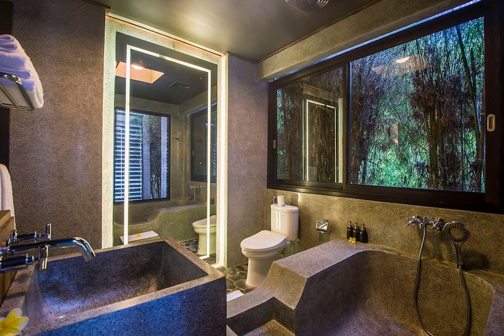 Enjoy views of the bamboo jungle from your oversized bathtub. (doubles as stand up shower)