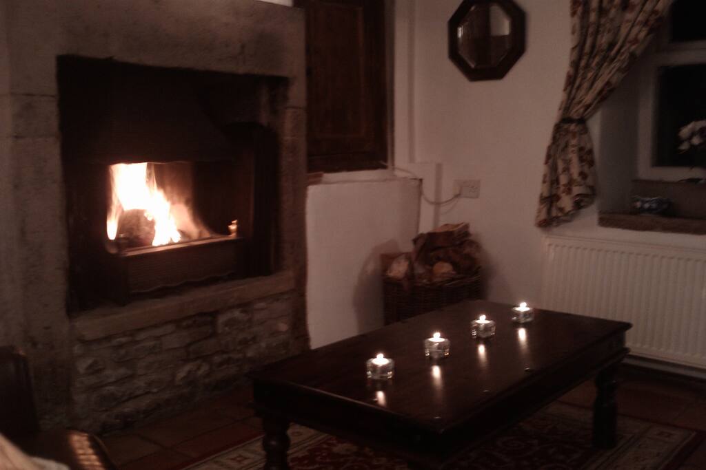Romantic candlelit lounge in front of the roaring fire