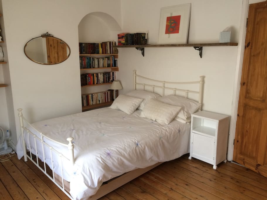 The main bedroom with a double bed.