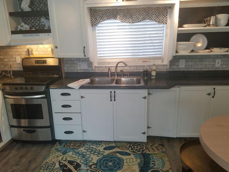 This cottage kitchen is complete for all your culinary needs.